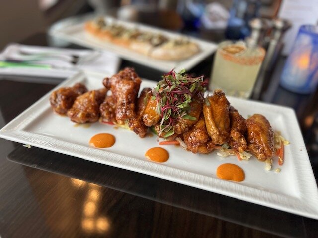 a plate of chicken wings